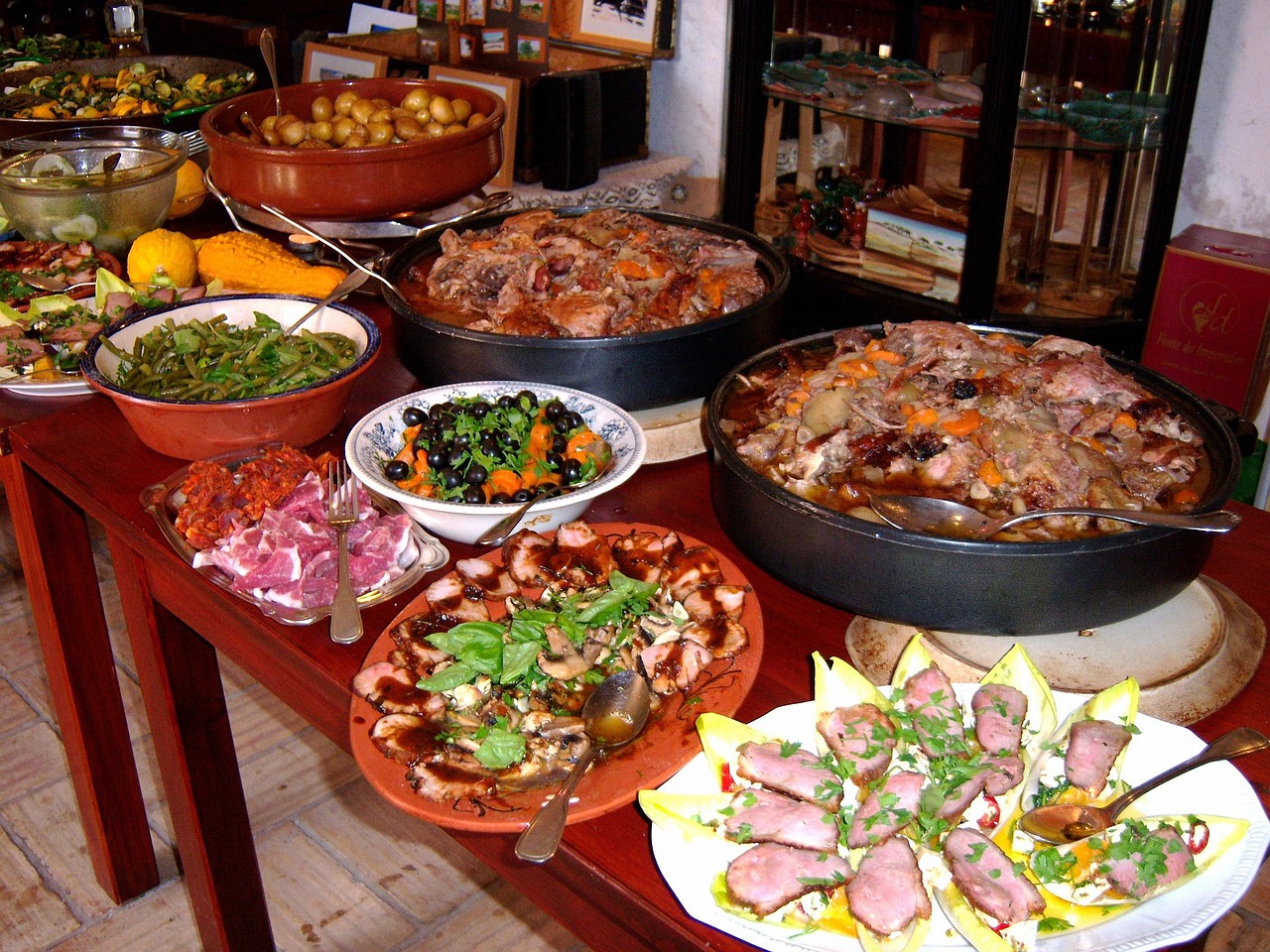 Extensive buffet setup with hot and cold stations, featuring international cuisine